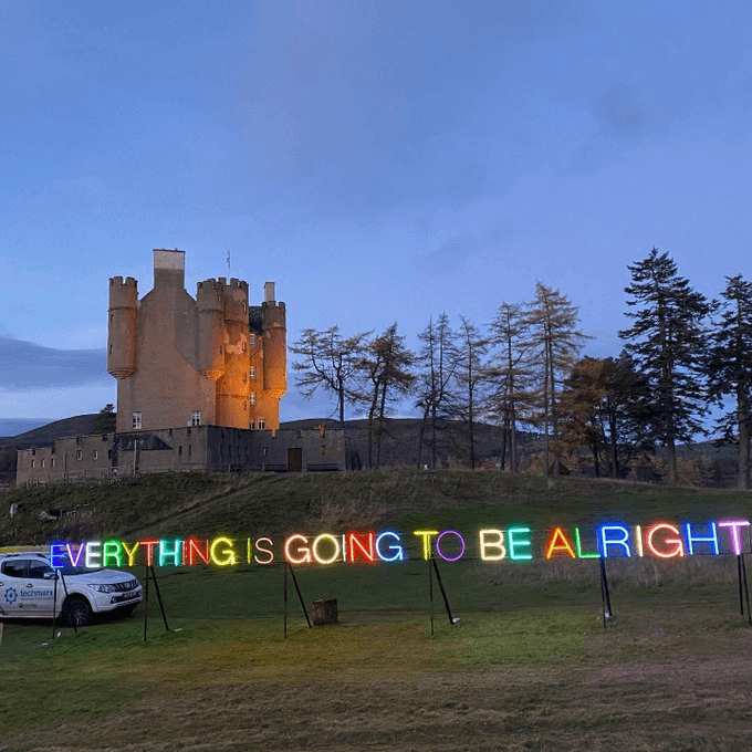 Martin Creed neon installation at dusk